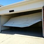 how to fix a bent garage door