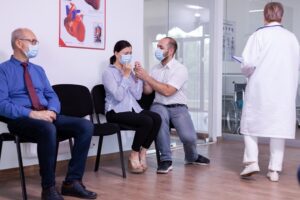 woman-her-husband-crying-new-normal-hospital-waiting-room-because-clinic-test-results-medical-staff-giving-unfavorable-news-stressed-man-woman-medic-appointment