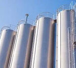 Industrial storage silos designed by professional Silo Manufacturers for cement and bulk materials