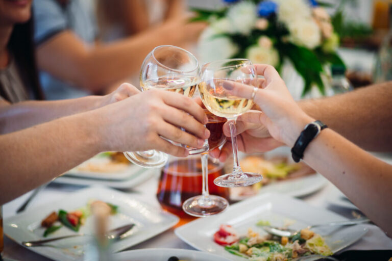 The,Guests,Keeping,Glass,Of,Champagne