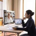 focused-indian-female-young-employee-talking-boss-business-team-online-virtual-conference-chat-discussing-project-stats-reports-financial-analytics-with-office-coworkers-video-call_650366-7067