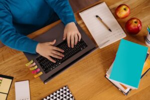 preteen-boy-uses-laptop-make-online-classes_158595-7541