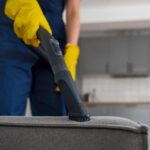 front-view-woman-cleaning-home_23-2150453344