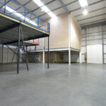 interior view of emty warehouse and mezzanine floor