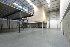 interior view of emty warehouse and mezzanine floor