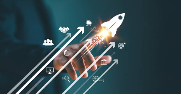 A professional touching a screen showing rising growth arrows, business icons, and a launching rocket symbolising a successful B2B marketing campaign.