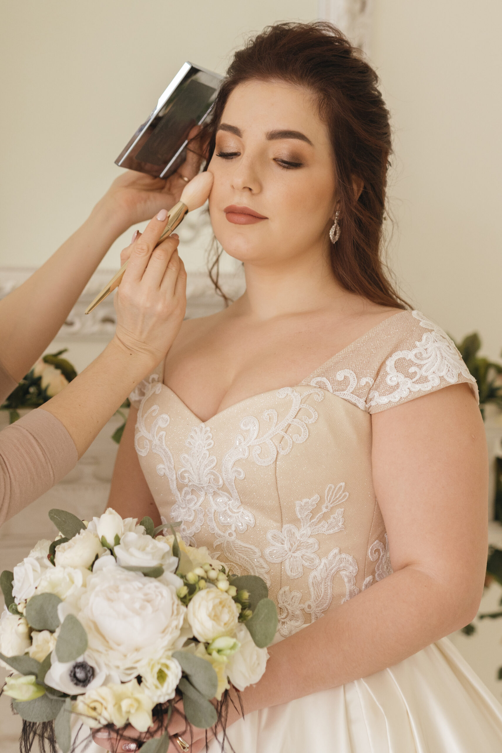 bride-getting-her-make-up-ready-scaled