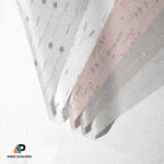 Elegant custom wrapping paper sheets in soft neutral and blush pink tones with delicate botanical patterns by Print On Papers.